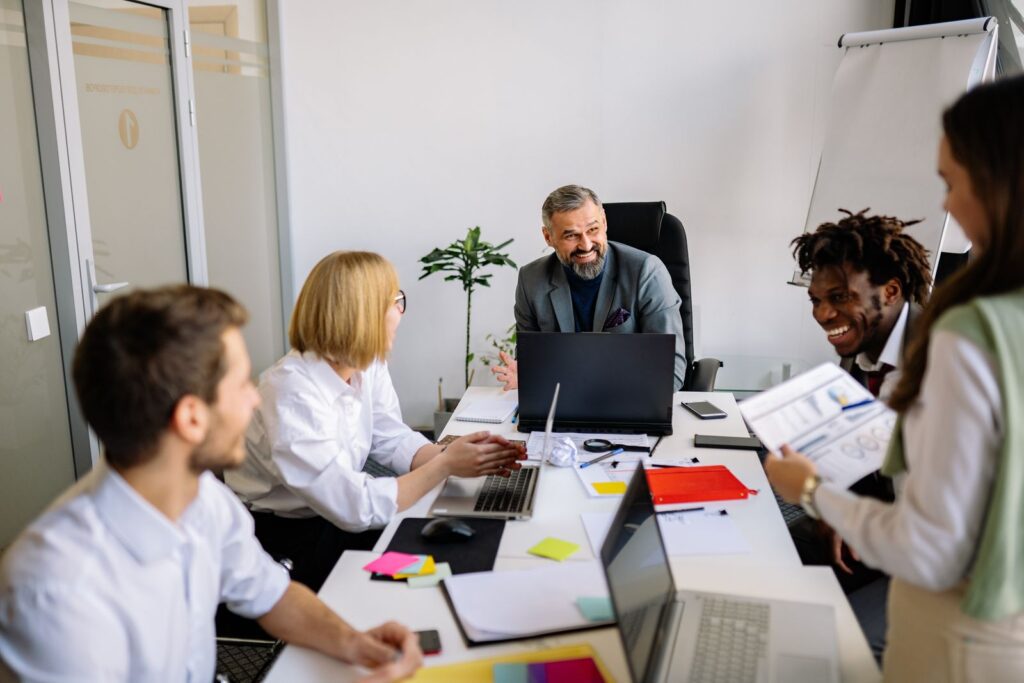 Legal professionals collaborating in office